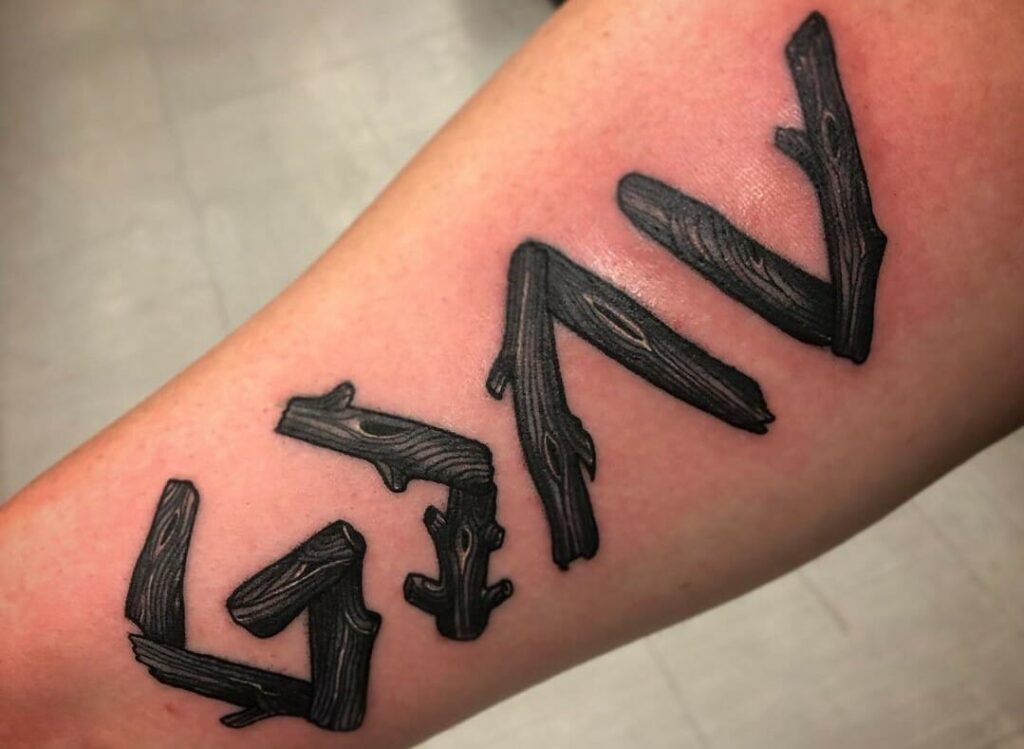 The Meaning Behind "God Is Greater Than the Highs and Lows" Tattoo